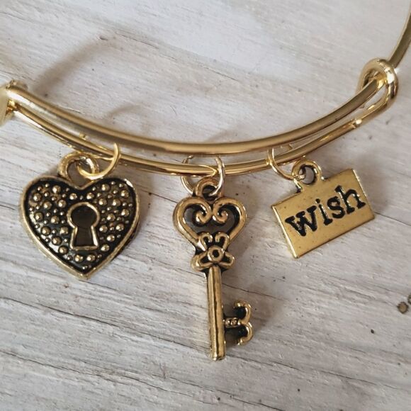 Bracelets by Sandra gold tone adjustable, wish - Picture 2 of 2